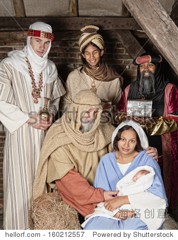 live christmas nativity scene reenacted in a medieval barn