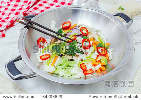 healthy vegetable stir fry cooked in a wok