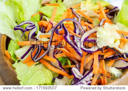 mixed salad in a wooden bowl