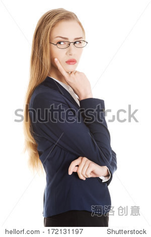beautiful business woman in eyeglasses with finger on her cheek