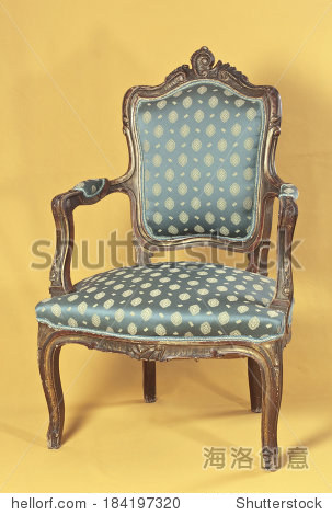 louis xv armchair on yellow ocher background