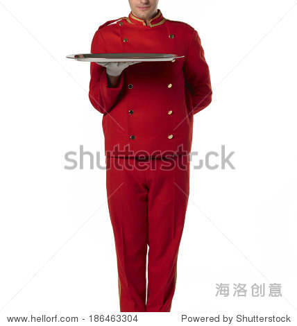 bellboy with tray and red suit isolated on white.