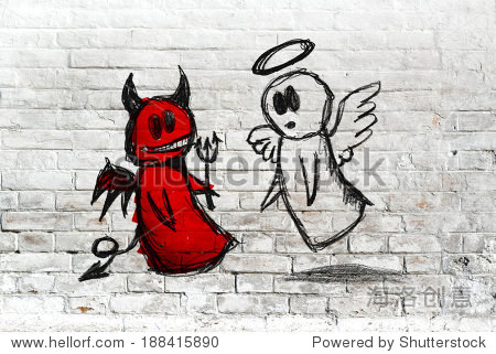 doodle drawing of angel and devil fighting on white brick wall.