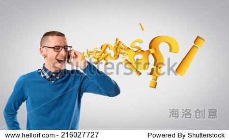 young businessmen shouting to mobile over grey background.