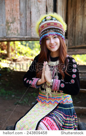 traditionally dressed mhong hill tribe woman pay respect at the