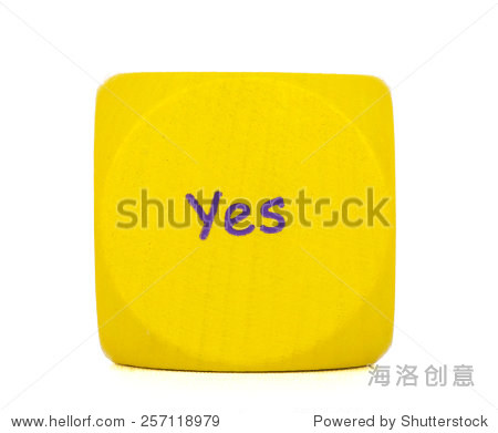 yellow dice with option "yes", isolated on white
