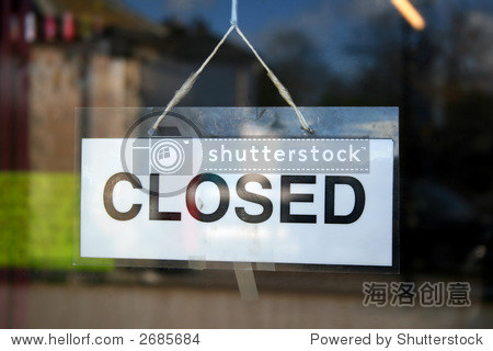 a closed sign in a shop window.