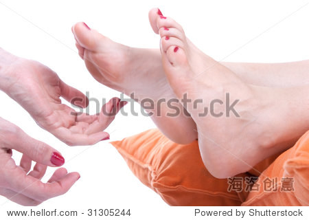tickling women feet and laughing hard studio shot