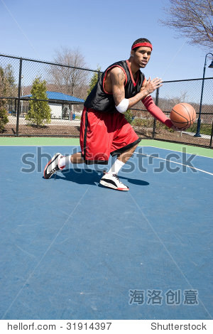 a young basketball player driving to the hoop demonstrating his