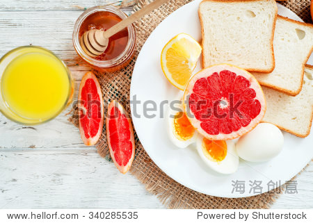 healthy diet breakfast, boiled eggs with white toast, fresh