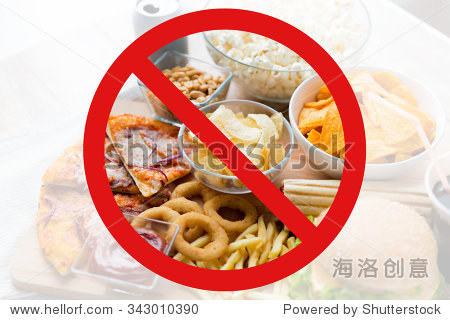 concept -close up of fast food snacks and cola drink behind no