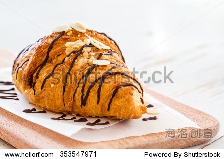 delicious fresh croissant on white background, copy space, close