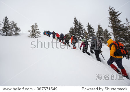 Winter ascent of the mountain climbers in the snow storm (blizzard). Carpathian  Ukraine  Europe.  (hi res  high quality)