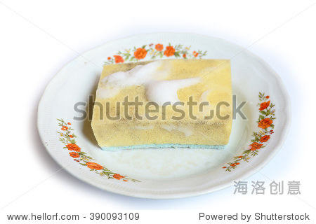yellow kitchen sponge isolated on white background.