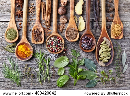 herbs and spices on a wooden board
