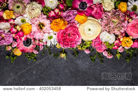 various flowers on black background.