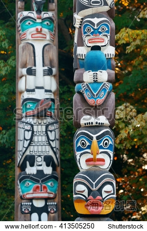 indian totem poles in stanley park in vancouver canada.