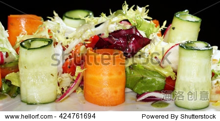 macro creative mixed vegetable salad on white dish studio
