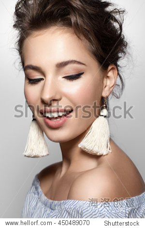 Close-up face woman with a charming smile in 