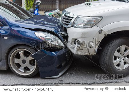 car crash from car accident on the road in a city between saloon