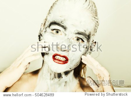 face and neck girls smeared with gray colors and bright red