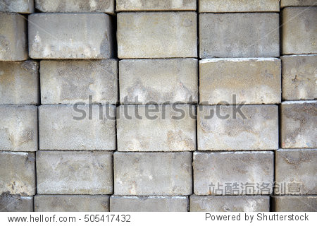 construction and building material concept - batch of bricks