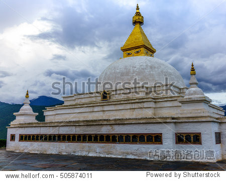 nepalist style buddhism white stupa with golden tip under a