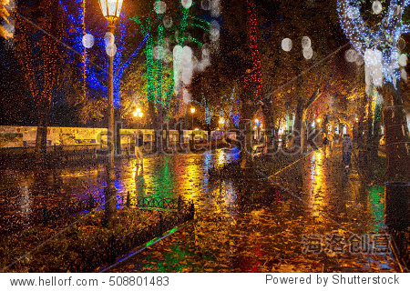 the ancient center of the city at night after rain.