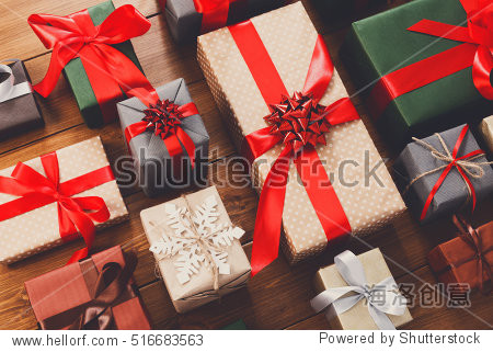 lots of gift boxes on wood background.
