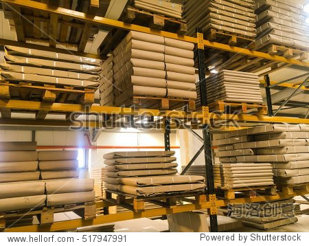 warehouse with rows of pallets with cartons of products import