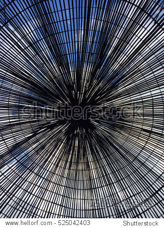 and blue sky look through the roof of hand crafted dome shaped