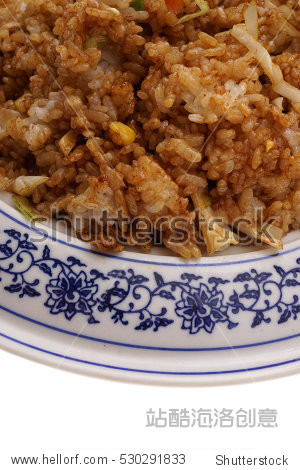 rice with vegetables in soya sauce, in white plate isolated on