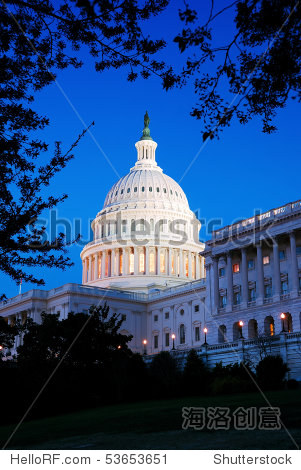 capitol hill building dome at dusk with light and blue sky