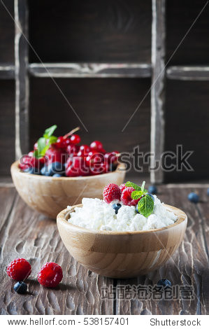 russian cottage cheese with berry and mint, selective focus