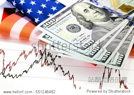 hundred us dollar bills lying on the chart and us flag.