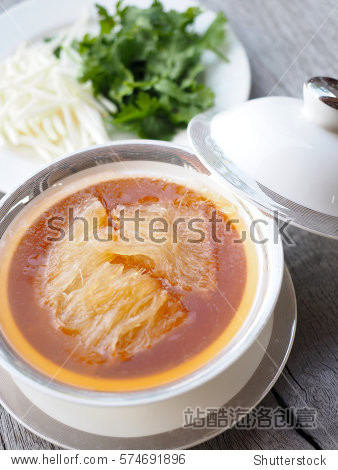 chinese sharks fin soup with brown sauce serve in royal white