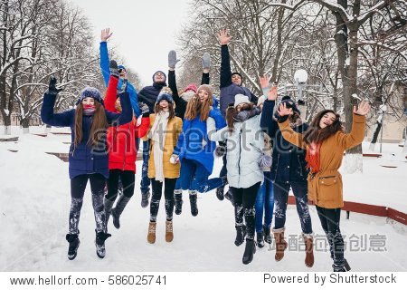 Classmates jump in the winter