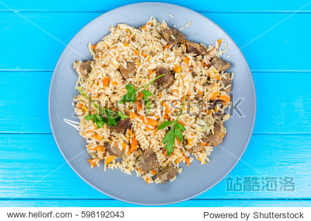 view of fried rice with beef on a plate.