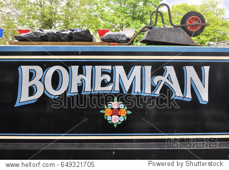 a traditional drop shadow style hand painted name panel on a