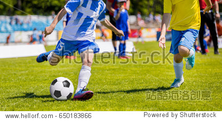 running youth soccer football players.