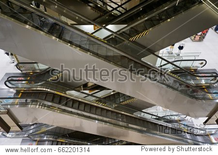 escalators in shopping mall in korea.