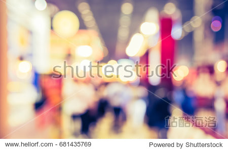 Abstract blur image of Shopping mall or Exhibition hall with bokeh for background usage . (vintage tone)