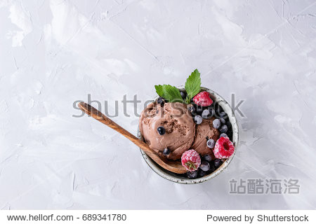 homemade chocolate ice cream with frozen berries blueberry