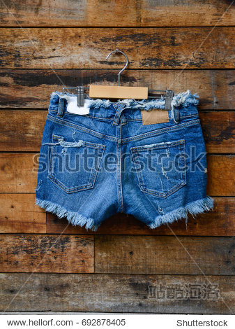female back blue torn jeans shorts.