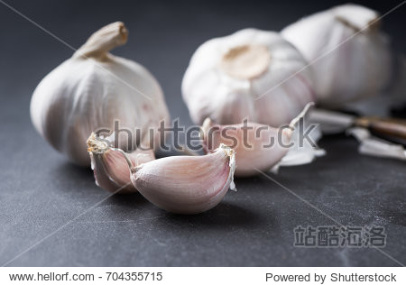 white garlic on black background, most ingredient for cook thai
