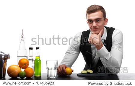portrait of a cute and professional bartender behind a bar