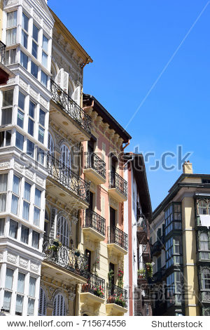 low angle view of brightly coloured apartments in bilbao, basque