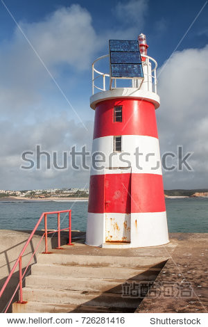 breakwater with a lighthouse to guide.