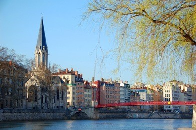quay of saone river in lyon, france view on the old lyon, fourviere basilica and television tower
