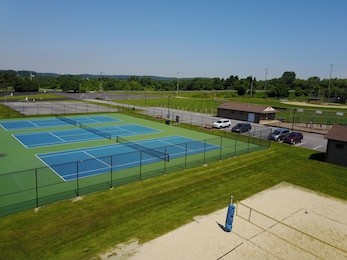 tennis courts and sand in a nice park